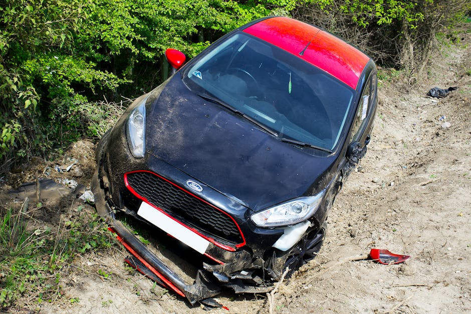 Damaged car after an accident on a dirt road in Welwyn Garden City, UK.